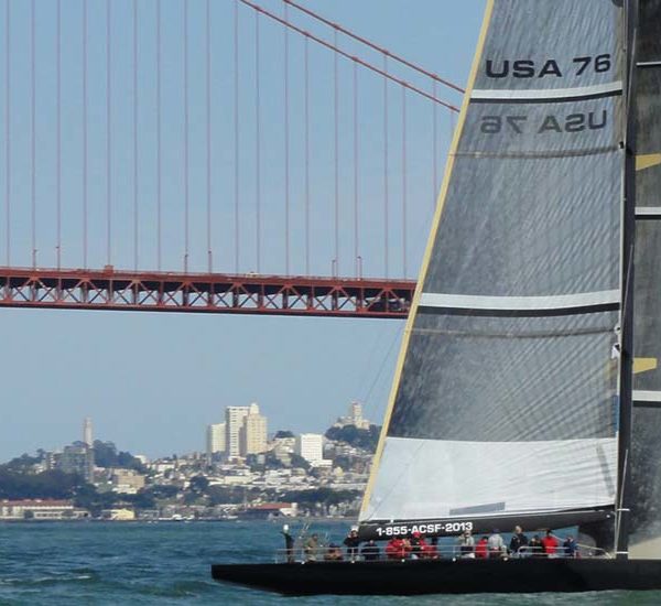 AC Sailing catamaran sailing under the Golden Gate Bridge