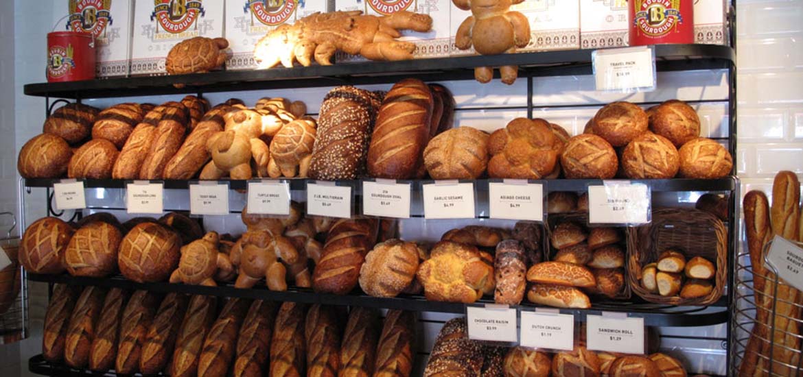 Fresh loaves of bread in different shapes at Boudin