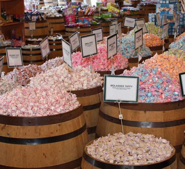 Barrels of colorful salt water taffy at Candy Baron