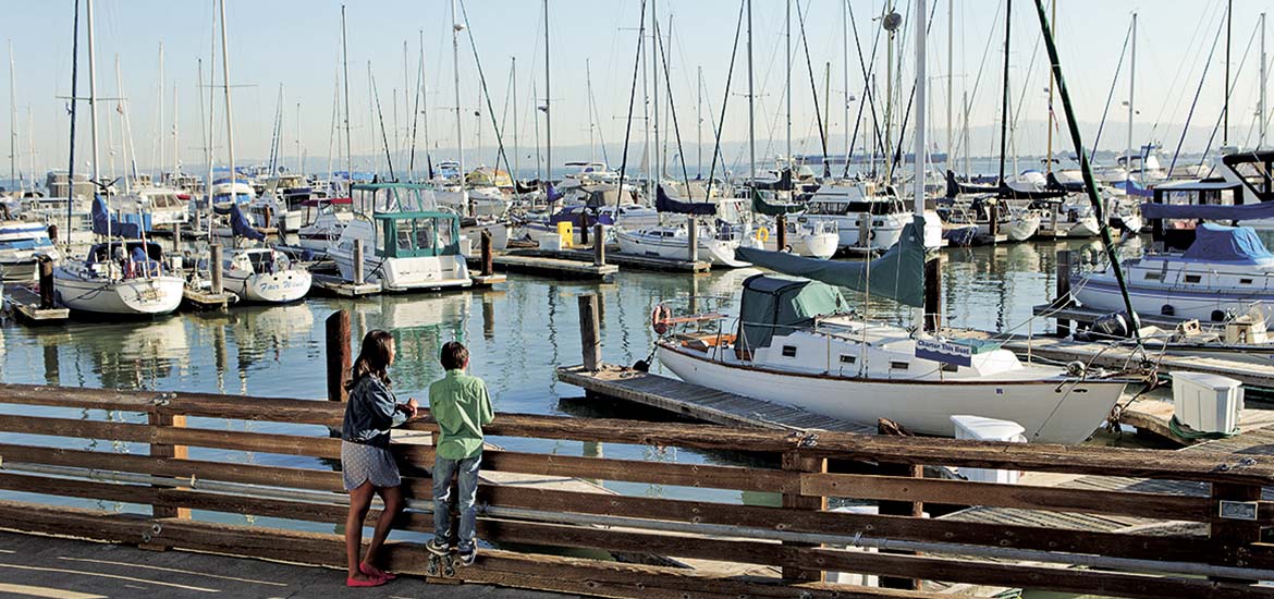 PIER 39 Marina with boats and people enjoying scenery